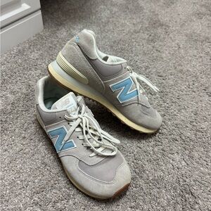 Women’s New Balance sneakers size 9.5. Only worn a few times.